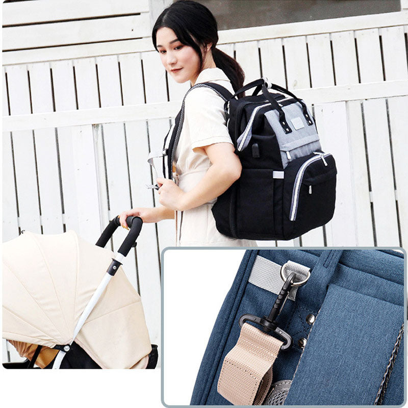 Diaper Backpack With Removable Mosquito Net, Large Capacity Foldable Infants Baby Crib, and Waterproof Changing Pag